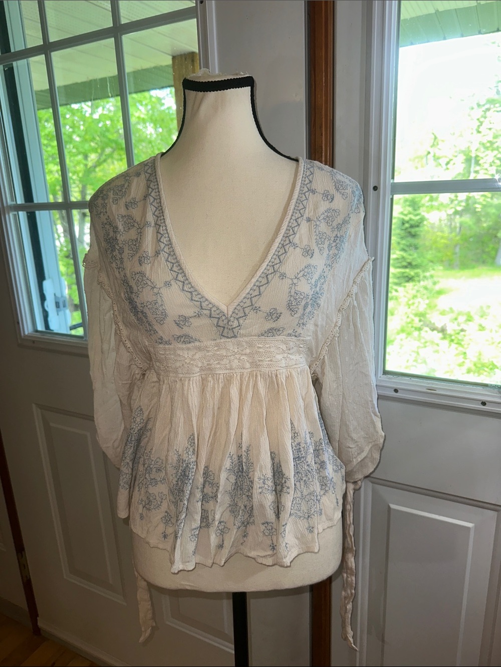American Eagle Outfitters Cream Peasant Top with Light Blue Floral Embroidery